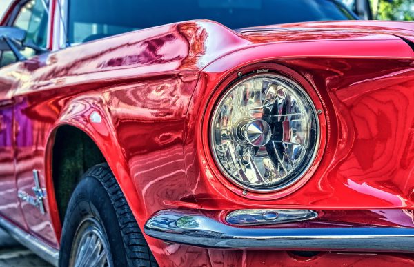 ford mustang with clear coat on red car