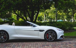 white aston martin with clear coat