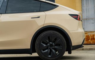 tesla model y wrapped in sandstorm color